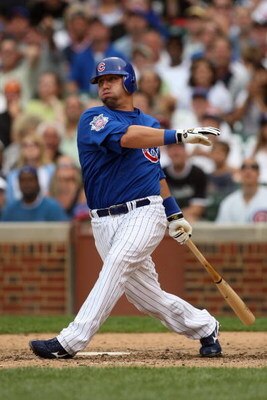 CHICAGO - JUNE 18:  Jake Fox #5 of the Chicago Cubs bats against the Chicago White Sox during the game on June 18, 2009 at Wrigley Field in Chicago, Illinois. (Photo by Jonathan Daniel/Getty Images)