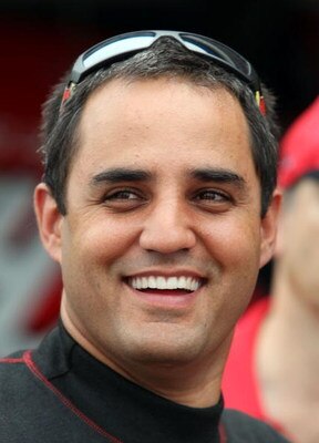 DARLINGTON, SC - MAY 08:  Juan Pablo Montoya, driver of the #42 Target Chevrolet, stands in the garage area during a break in practice for the NASCAR Sprint Cup Series Southern 500 on May 8, 2009 at Darlington Raceway in Darlington, South Carolina.  (Phot