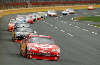 CONCORD, NC - MAY 25:  Juan Pablo Montoya, driver of the #42 Target Chevrolet, leads a group of cars during the NASCAR Sprint Cup Series Coca-Cola 600 on May 25, 2009 at Lowe's Motor Speedway in Concord, North Carolina.  (Photo by Streeter Lecka/Getty Ima