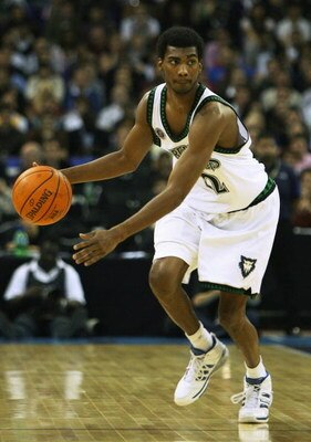 LONDON - OCTOBER 10:  Corey Brewer #22 of Minnesota runs with the ball during NBA Europe Live 2007 Tour match between the Boston Celtics and the Minnesota Timberwolves at the O2 Arena on October 10, 2007 in London, England.  NOTE TO USER: User expressly a