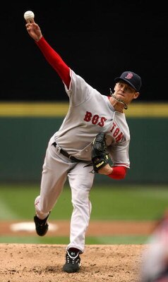 SEATTLE - JULY 23:  Starting pitcher Clay Buchholz #61 of the Boston Red Sox pitches against the Seattle Mariners on July 23, 2008 at Safeco Field in Seattle, Washington. (Photo by Otto Greule Jr/Getty Images)
