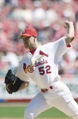 ST. LOUIS - APRIL 11:  Pitcher Bud Smith #52 of the St. Louis Cardinals throws a pitch during the MLB game against the Milwaukee Brewers at Busch Stadium in St. Louis, Missouri on April 11, 2002. The Cardinals defeated the Brewers 6-5. (Photo by Elsa Hasc