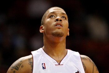 MIAMI - DECEMBER 08:  Michael Beasley #30 of the Miami Heat pauses while taking on the Charlotte Bobcats at American Airlines Arena on December 8, 2008 in Miami, Florida. NOTE TO USER: User expressly acknowledges and agrees that, by downloading and/or usi