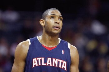 CHARLOTTE, NC - MARCH 6:  Al Horford #15 of the Atlanta Hawks looks on against the Charlotte Bobcats during their game at Time Warner Cable Arena on March 6, 2009 in Charlotte, North Carolina.  NOTE TO USER: User expressly acknowledges and agrees that, by