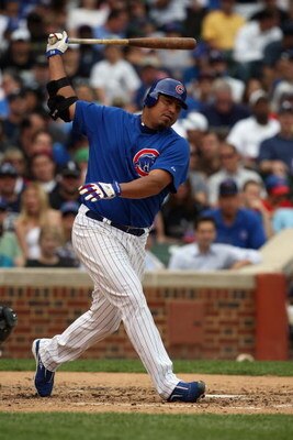CHICAGO - JUNE 18:  Carlos Zambrano #38 of the Chicago Cubs bats against the Chicago White Sox during the game on June 18, 2009 at Wrigley Field in Chicago, Illinois. (Photo by Jonathan Daniel/Getty Images)