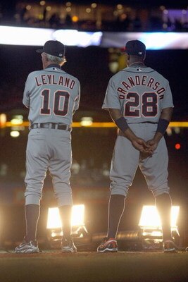 TORONTO - APRIL 6: Manager Jim Leyland #10 and Curtis Granderson #28 of the Detroit Tigers stand on the field during introductions before the Opening Day game against the Toronto Blue Jays at the Rogers Centre April 6, 2009 in Toronto, Ontario. (Photo by: