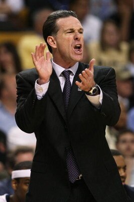 BOSTON - MARCH 26:  Head coach Jamie Dixon of the Pittsburgh Panthers claps during their game against the Xavier Musketeers during the NCAA Men's Basketball Tournament East Regionals at TD Banknorth Garden on March 26, 2009 in Boston, Massachusetts.  (Pho