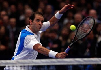NEW YORK - MARCH 10:  Pete Sampras hits a backhand volley to Roger Federer of Switzerland during their exhibition match on March 10, 2008 at Madison Square Garden in New York City.  (Photo by Nick Laham/Getty Images)