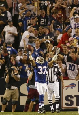 ORCHARD PARK, NY - OCTOBER 8:  George Wilson #37 of the Buffalo Bills celebrates scoring on an interception return for a touchdown against the Dallas Cowboys at Ralph Wilson Stadium October 8, 2007 in Orchard Park, New York.  (Photo by Rick Stewart/Getty 