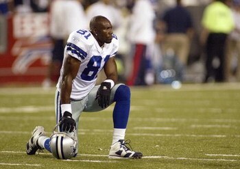 ORCHARD PARK, NY - OCTOBER 8: Terrell Owens #81 of the Dallas Cowboys kneels on the field during the game against the Buffalo Bills at Ralph Wilson Stadium October 8, 2007 in Orchard Park, New York. (Photo by Rick Stewart/Getty Images)