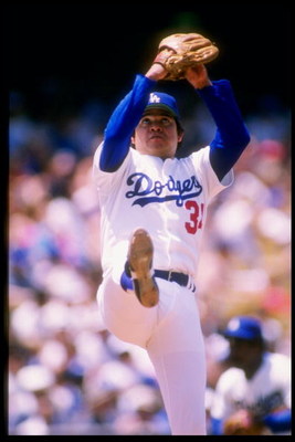 Pitcher Fernando Valenzuela of the Los Angeles Dodgers prepares to throw the ball during a game against the Houston Astros at Dodger Stadium in Los Angeles, California.