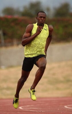 KINGSTON, JAMAICA - APRIL 06:  Usain Bolt of Jamaica in action during a training session at the National Stadium on April 6, 2009 in Kingston, Jamaica.  (Photo by Ian Walton/Getty Images)