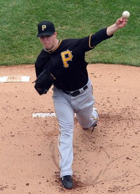 NEW YORK - MAY 09:  Paul Maholm #28 of the Pittsburgh Pirates pitches against the New York Mets on May 9, 2009 at Citi Field in the Flushing neighborhood of the Queens borough of New York City.  (Photo by Jim McIsaac/Getty Images)