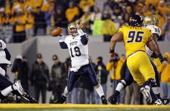 MORGANTOWN, WV - DECEMBER 1: Pat Bostick #19 of the Pittsburgh Panthers passes during the game against the West Virginia Mountaineers at Milan Puskar Stadium on December 1, 2007 in Morgantown, West Virginia. Pittsburgh defeated West Virginia 13-9. (Photo 