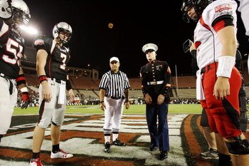 ORLANDO, FL - JANUARY 04:  Quarterback Garrett Gilbert #7 of the black team watches the coin flip before the All America Under Armour Football Game at Florida Citrus Bowl on January 4, 2009 in Orlando, Florida.  (Photo by Doug Benc/Getty Images)