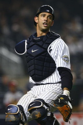 NEW YORK - MAY 01: Jorge Posada #20 of the New York Yankees fields against the Los Angeles Angels of Anaheim during their game on May 1, 2009 at Yankee Stadium in the Bronx borough of New York City. (Photo by Chris McGrath/Getty Images)