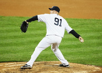 NEW YORK - JUNE 18: Alfredo Aceves #91 of The New York Yankees pitches against The Washington Nationals during their game on June 18th, 2009 at Yankee Stadium in the Bronx Borough of New York. (Photo by Al Bello/Getty Images)