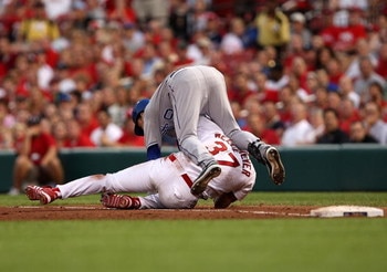 ST. LOUIS - JUNE 20:  Fernando Cortez #30 of the Kansas City Royals collides with starting pitcher Todd Wellemeyer #37 of the St. Louis Cardinals at first base during the 4th inning of the game on June 20, 2007 at Busch Stadium in St. Louis, Missouri.  (P