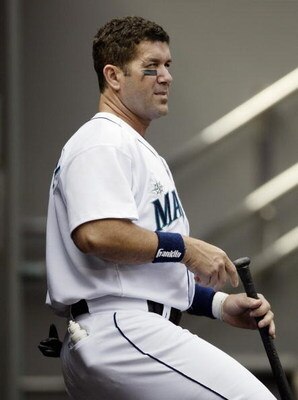 SEATTLE - AUGUST 14:  Designated hitter Edgar Martinez #11 of the Seattle Mariners watches the game against the New York Yankees at Safeco Field on August 14, 2004 in Seattle, Washington.  The Yankees won 6-4.  (Photo by Otto Greule Jr/Getty Images)