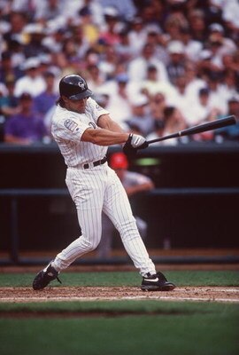14 Jun 1995: Outfielder Dante Bichette of the Colorado Rockies focuses on the ball as he attempts to make contact during an at-bat in the Rockies 10-4 victory over the Cincinnati Reds at Coors Field in Denver, Colorado.