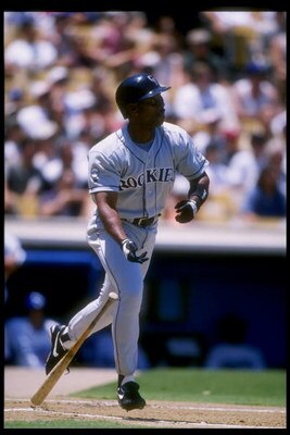 8 Jul 1996:  Center fielder Ellis Burks of the Colorado Rockies watches his shot during a game against the Los Angeles Dodgers at Dodger Stadium in Los Angeles, California.  The Rockies won the game 3-0. Mandatory Credit: Jed Jacobsohn  /Allsport