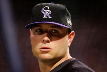 BOSTON - OCTOBER 25:  Matt Holliday #5 of the Colorado Rockies warms up before the Rockies take on the Boston Red Sox in Game Two of the 2007 Major League Baseball World Series at Fenway Park on October 25, 2007 in Boston, Massachusetts.  (Photo by Jim Mc