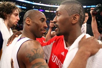 LOS ANGELES, CA - MAY 17:  Kobe Bryant #24 of the Los Angeles Lakers hugs Ron Artest #96 of the Houston Rockets after the Lakers defeated the Rockets 89-70 in Game Seven of the Western Conference Semifinals during the 2009 NBA Playoffs at Staples Center o