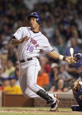 CHICAGO - AUGUST 5: Moises Alou #18 of the New York Mets swings at the pitch against the Chicago Cubs at Wrigley Field August 5, 2007 in Chicago, Illinois. (Photo by Jonathan Daniel/Getty Images)