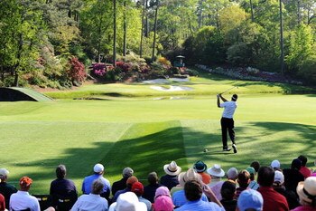 AUGUSTA, GA - APRIL 12:  Kenny Perry hits his tee shot on the 12th hole during the final round of the 2009 Masters Tournament at Augusta National Golf Club on April 12, 2009 in Augusta, Georgia.  (Photo by Harry How/Getty Images)