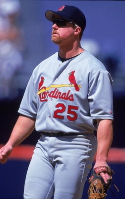 13 Jun 2000:  Mark McGwire #25 of the St Louis Cardinals watches the action during the game against the San Diego Padres at Qualcomm Stadium in San Diego, California.  The Cardinals defeated the Padres 8-3.Mandatory Credit: Tom Hauck  /Allsport