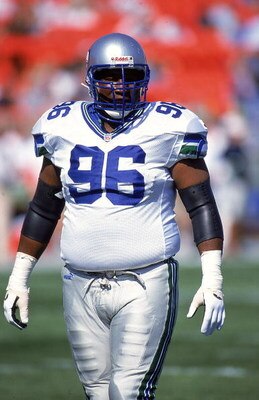 19 Sep 1999:  Cortez Kennedy #96 of the Seattle Seahawks looks on from the field during the game against the Chicago Bears at Soldier Field in Chicago, Illinois. The Seahawks defeated the Bears 14-13. Mandatory Credit: Jonathan Daniel  /Allsport