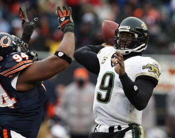 CHICAGO - DECEMBER 07: David Garrard #8 of the Jacksonville Jaguars throws a pass under pressure from Marcus Harrison #94 of the Chicago Bears on December 7, 2008 at Soldier Field in Chicago, Illinois. The Bears defeated the Jaguars 23-10. (Photo by Jonat