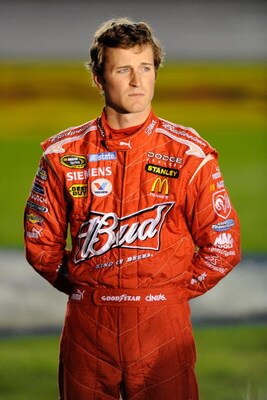 CONCORD, NC - OCTOBER 15:  Kasey Kahne, driver of the #9 Budweiser Dodge, stands on pit road during qualifying for the NASCAR Sprint Cup Series NASCAR Banking 500 at Lowe's Motor Speedway on October 15, 2009 in Concord, North Carolina.  (Photo by John Har
