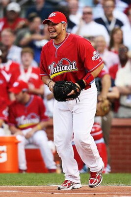 ST LOUIS, MO - JULY 13:  National League All-Star Yadier Molina of the St. Louis Cardinals looks on during the State Farm Home Run Derby at Busch Stadium on July 13, 2009 in St. Louis, Missouri.  (Photo by Elsa/Getty Images)