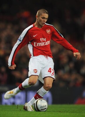 LONDON - NOVEMBER 11:  Henri Lansbury of Arsenal passes the ball during the Carling Cup fourth round match between Arsenal and Wigan Athletic at the Emirates Stadium on November 11, 2008 in London, England.  (Photo by Shaun Botterill/Getty Images)