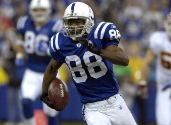 Indianapolis Colts wide receiver Marvin Harrison  grabs a pass  against the Kansas City Chiefs in Wild Card Playoff action on January 6, 2007 at the RCA Dome in Indianapolis, Indiana. The Colts defeated the Chiefs 23 - 8.  (Photo by Al Messerschmidt/Getty