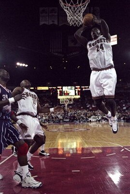 17 Mar 1999:  Antonio McDyess #24 of the Denver Nuggets in the air going for a slam dunk during the game against the Houston Rockets at the McNichols Arena in Denver, Colorado. The Rockets defeated the Nuggets 114-103.   Mandatory Credit: Brian Bahr  /All