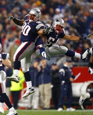 FOXBORO, MA - OCTOBER 20: Le Kevin Smith #90 and Tedy Bruschi #54 of the New England Patriots celebrates a fumble recovery against the Denver Broncos at Gillette Stadium on October 20, 2008 in Foxboro, Massachusetts.The Patriots won 41-7. (Photo by Jim Ro