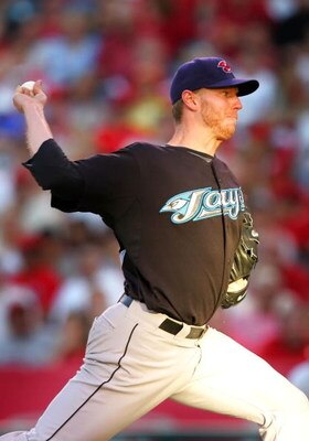 ANAHEIM, CA - JULY 05:   Roy Halladay #32 of the Toronto Blue Jays pitches against the Los Angeles Angels of Anaheim at Angels Stadium on July 5, 2008 in Anaheim, California.  (Photo by Lisa Blumenfeld/Getty Images)