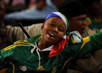 BLOEMFONTEIN, SOUTH AFRICA - JUNE 20:  A Bafana Bafana supporter sings prior to the FIFA Confederations Cup match between Spain and South Africa at Free State Stadium on June 20, 2009 in Bloemfontein, South Africa.  (Photo by Jasper Juinen/Getty Images)