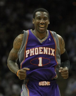 SAN ANTONIO - APRIL 29:  Amare Stoudemire #1 of the Phoenix Suns reacts to no foul called after his layup against the San Antonio Spurs during the second quarter in Game Five of the Western Conference Quarterfinals during the 2008 NBA Playoffs at the AT&T