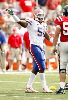 OXFORD, MS - SEPTEMBER 22: Brandon Spikes #51 of the Florida Gators reacts after a play against the Mississippi Rebels on September 22, 2007 at Vaught-Hemingway Stadium/Hollingsworth Field in Oxford, Mississippi. Florida won  30-24. (Photo by Joe Murphy/G