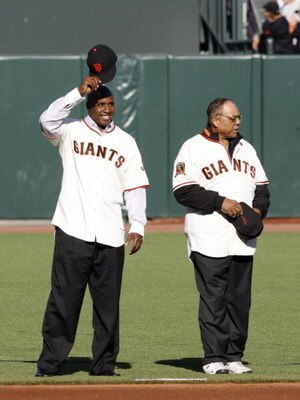 SAN FRANCISCO - AUGUST 9: Barry Bonds motions to fans with Willie Mays during a San Francisco Giants 50th Anniversary celebration before the game between the Los Angeles Dodgers and San Francisco Giants at AT&T Park on August 9, 2008 in San Francisco, Cal