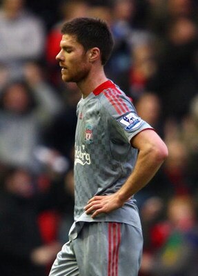 MIDDLESBROUGH, UNITED KINGDOM - FEBRUARY 28:  Xabi Alonso of Liverpool shows his dejection at the end of the Barclays Premier League match between Middlesbrough and Liverpool at the Riverside Stadium on February 28, 2009 in Middlesbrough, England.  (Photo