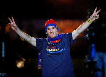 BARCELONA, SPAIN - MAY 28: Lionel Messi celebrates at the Nou Camp Stadium the day after Barcelona won the UEFA Champions League Cup final on May 28, 2009 in Barcelona, Spain. Barcelona beat Manchester United in the final in Rome.  (Photo by Denis Doyle/G