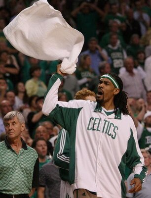 BOSTON - APRIL 28:  Mikki Moore #7 of the Boston Celtics tries to rally the fans against the Chicago Bulls in Game Five of the Eastern Conference Quarterfinals during the 2009 NBA Playoffs at TD Banknorth Garden on April 28, 2009 in Boston, Massachusetts.