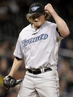 DETROIT - SEPTEMBER 27:  B.J.Ryan #52 of the Toronto Blue Jays reacts after beating the Detroit Tigers 7-4 on September 27, 2006 at Comerica Park in Detroit, Michigan.  (Photo by Gregory Shamus/Getty Images)  
