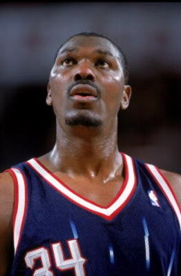 9 Dec 2000:  A close up of Hakeem Olajuwon #34 of the Houston Rockets as he looks on during the game against the Seattle SuperSonics at Key Arena in Seattle, Washington. The Rockets defeated the SuperSonics 111-104.    NOTE TO USER: It is expressly unders