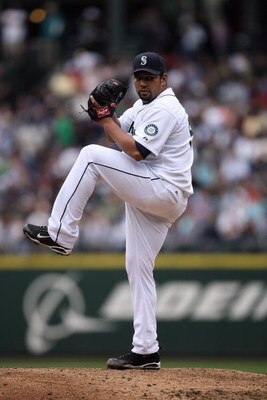 SEATTLE - APRIL 19:  Carlos Silva #52 of the Seattle Mariners pitches against the Detroit Tigers during the game on April 19, 2009 at Safeco Field in Seattle, Washington. (Photo by Otto Greule Jr/Getty Images)