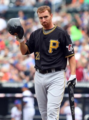 NEW YORK - MAY 09:  Adam LaRoche #25 of the Pittsburgh Pirates bats against the New York Mets on May 9, 2009 at Citi Field in the Flushing neighborhood of the Queens borough of New York City. The Mets defeated the Pirates 10-1.  (Photo by Jim McIsaac/Gett